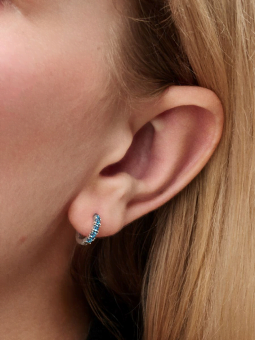 Light Blue Huggie Earrings - Image 2