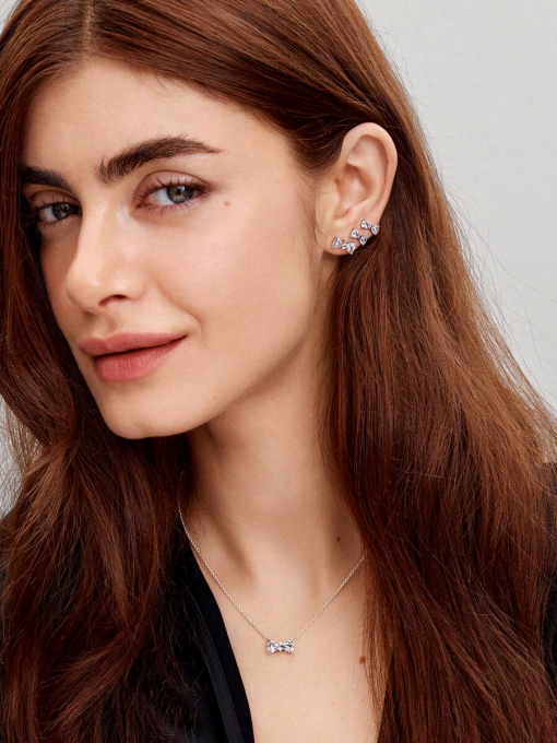 Sparkling Small Bow Stud Earrings - Image 5